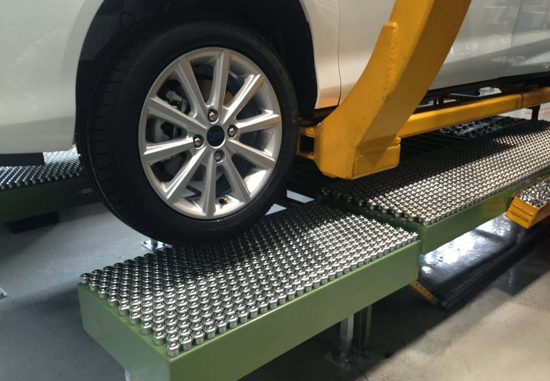 Car wheel on ball deck